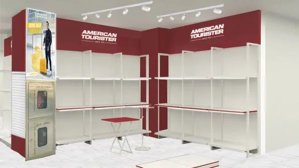 Angled view of the American Tourister shop corner with a poster column